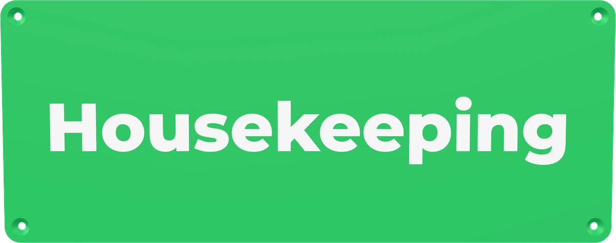 A green door plate reading Housekeeping in raised white lettering.
